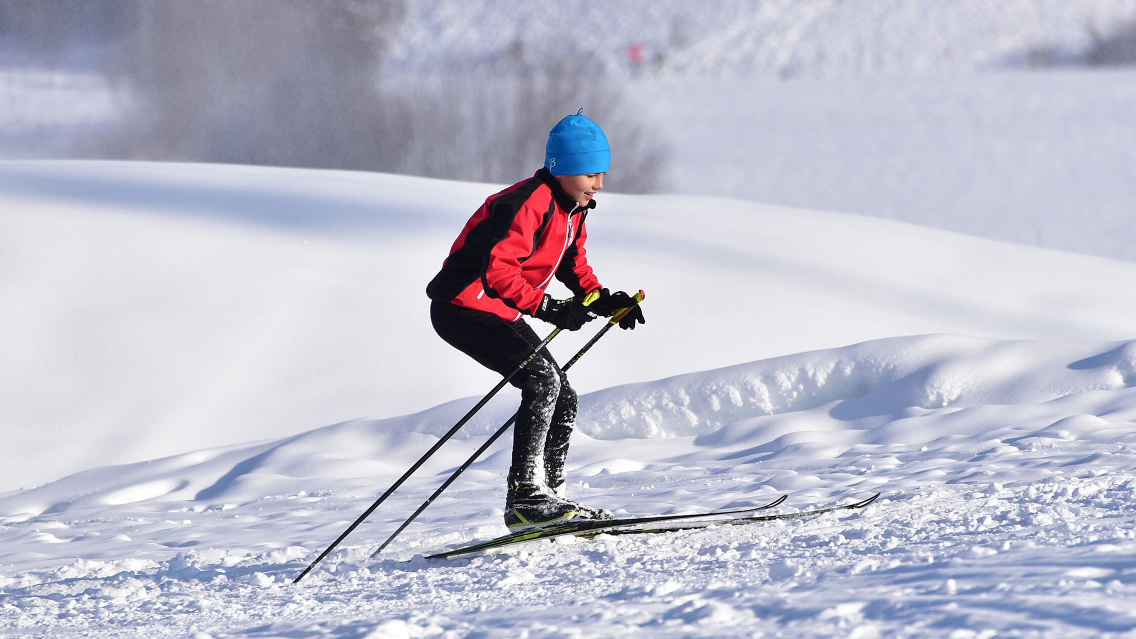 Winter sports at the Alpen Arena Villach Boy on skis at Wasenboden