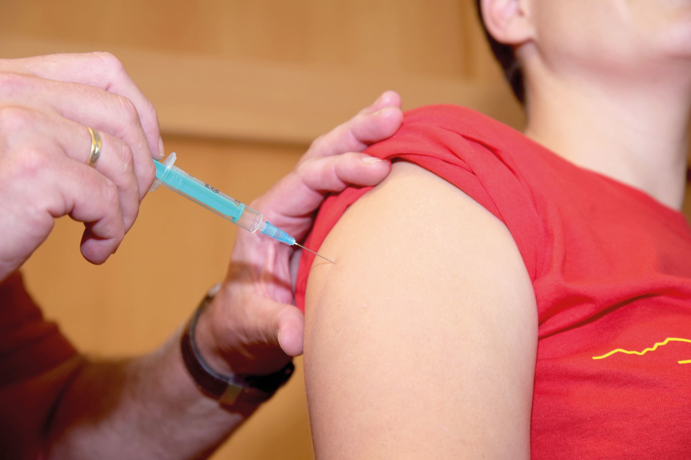 A patient is getting vaccinated