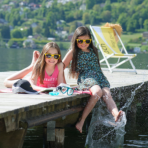 Children at the jetty at lake Ossiach