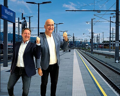 <66 Minutes Koralm Campaign Günther Albel and Georg Overs at Villach Main Station