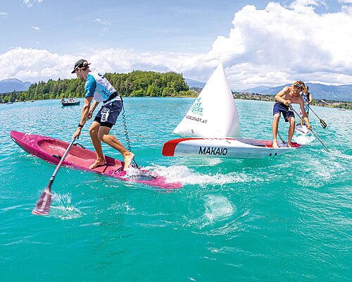 Two paddlers fight for the victory