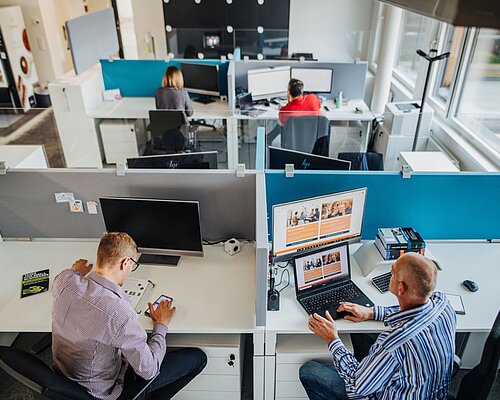 Workers in the open-plan office