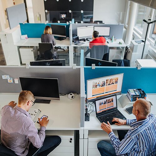 Workers in the open-plan office