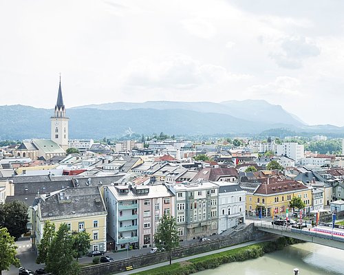 Downtown, the river Drau and St. Jacob's church in Villach