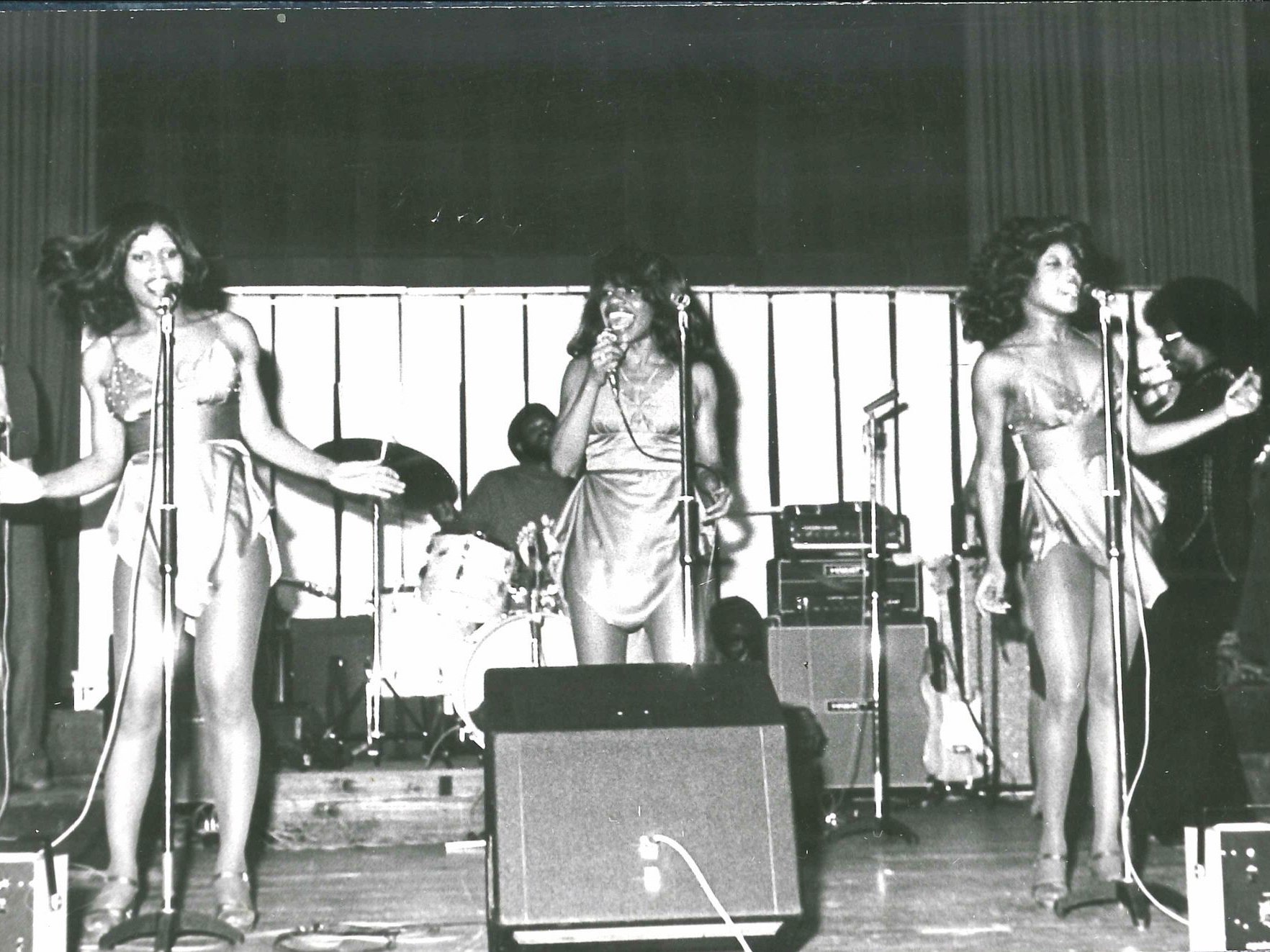 Black and white photograph of women performing on the CCV stage