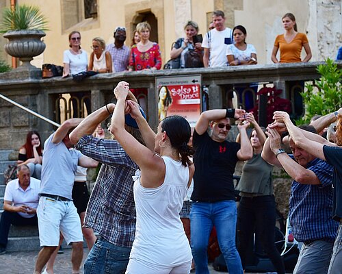 People Dancing in Villach's Downtown