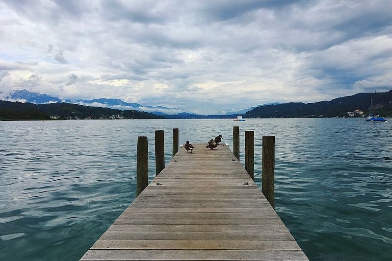 Beautiful view onto lake Faaker See from a jetty