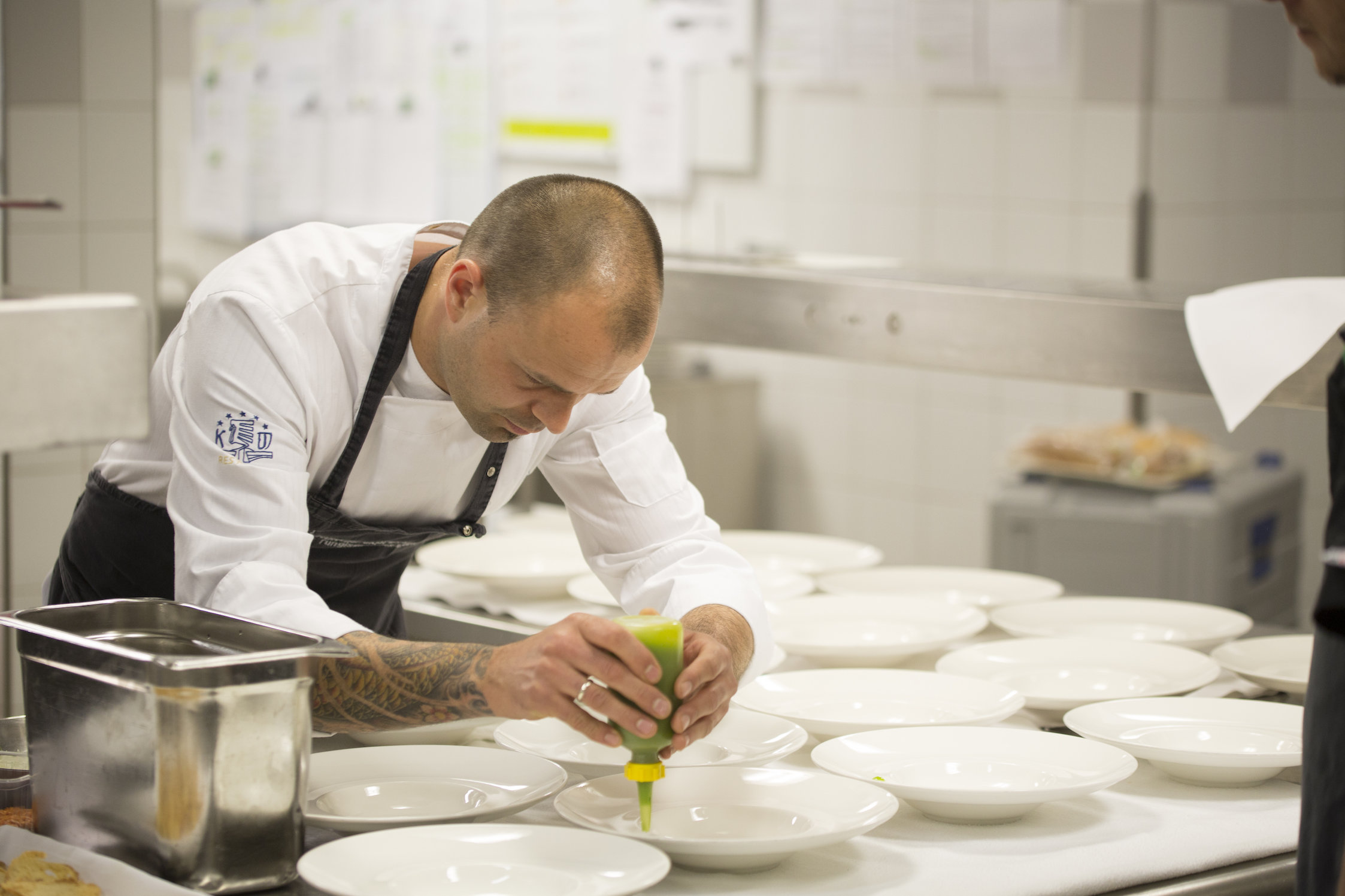 Cook preparing plates