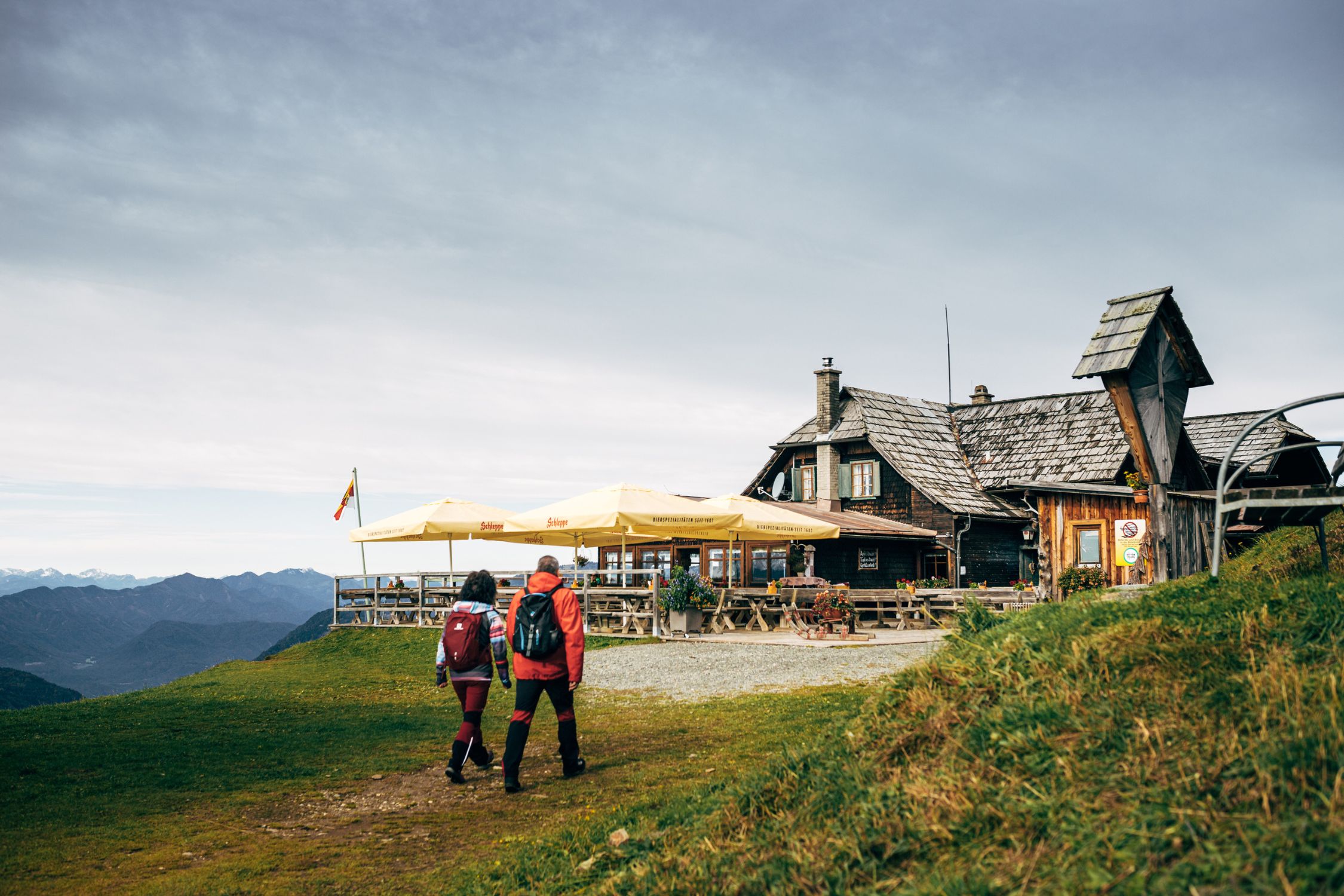 Hikers reaching a mountain hut