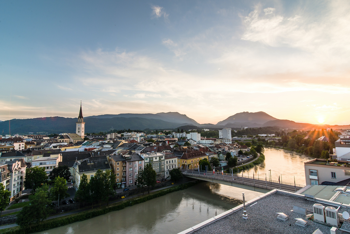 The city of Villach during sunset