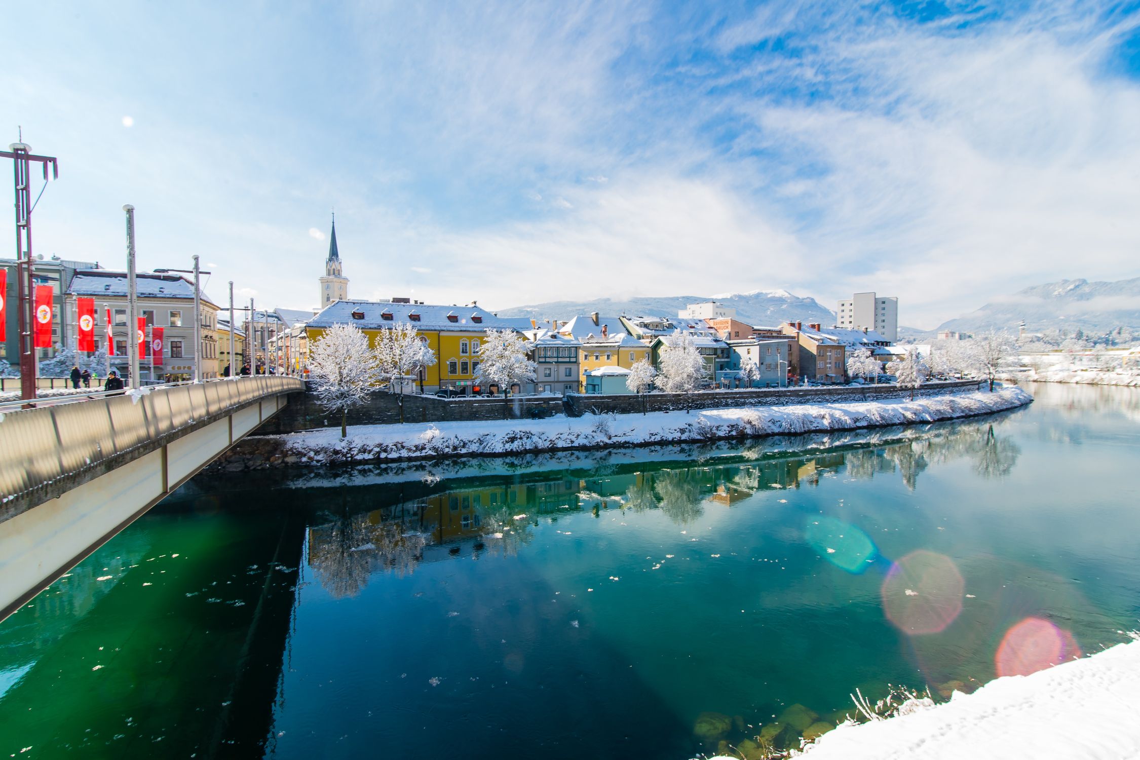 View of Villach's city center across the Drau